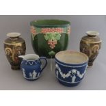 A Wedgwood dark blue Jasper dip planter, a jug, an Arts & Crafts green glaze planter and a pair of