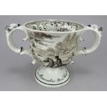 An early nineteenth century brown and white transfer-printed two-handled commemorative loving c.