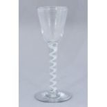 An 18th Century cordial glass, circa 1760, conical bowl, opaque spiral twist stem, circular foot,