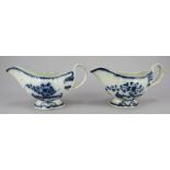 A pair of late eighteenth century blue and white hand-painted and moulded sauce boats, c.1780-90.