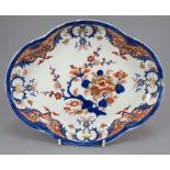 An early nineteenth century Derby porcelain puce mark dessert dish c. 1800. It is painted in blue