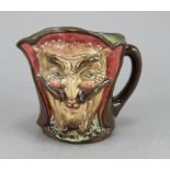 A small Royal Doulton Character jug of Mephistopheles (D 5758, with verse to underside). 8 cm