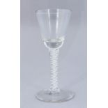 An 18th Century wine glass, circa 1770, conical bowl, double opaque twist stem, broken pontil,