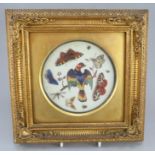 A nineteenth century porcelain plate centre that is cut down and framed, possibly continental, but