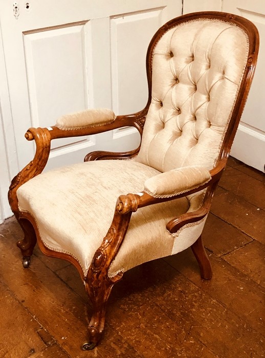 A Victorian walnut spoon back nursing armchair, ci