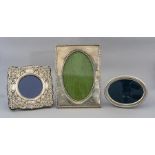 Three various easel photograph frames with silver
