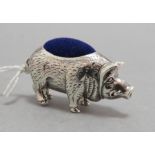 A contemporary sterling silver pin cushion in the