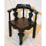 A George II oak corner chair, circa 1750, later ca