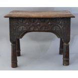 A 17th Century oak joint stool, plank top, lunette
