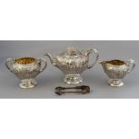 An early Victorian silver three piece tea set, flu