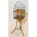 A late Victorian/Edwardian Aesthetic movement oak and brass revolving bookcase, circa 1900, brass