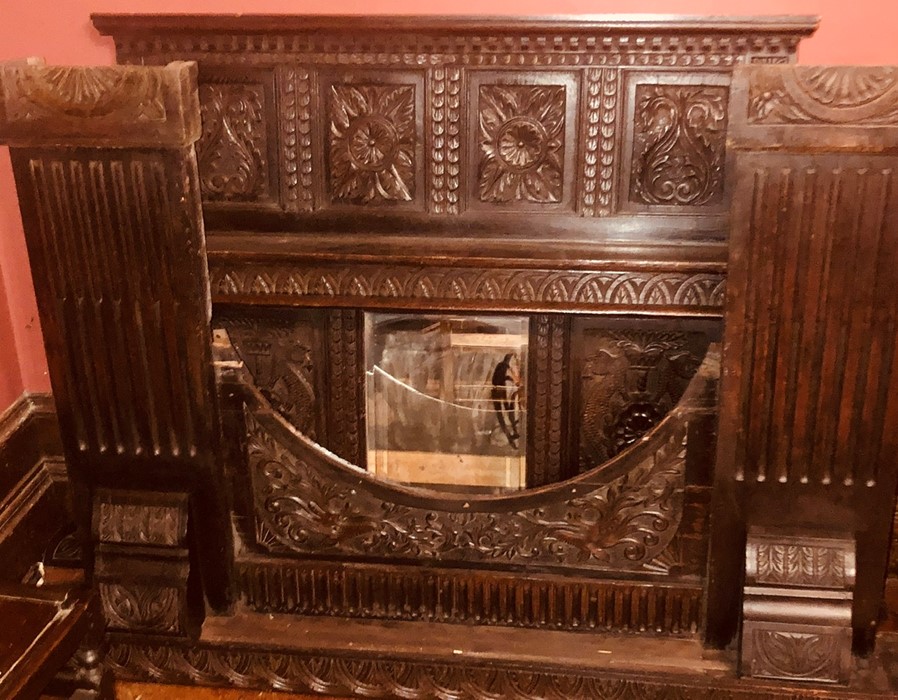 A George III oak fire surround of large proportion