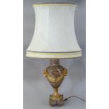 A pink veined marble table lamp base, of Louis XVI