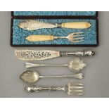 A cased pair of late Victorian silver fish servers