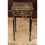 A Chinoiserie lacquered side table, circa 1920, serpentine slight oversailing top decorated of a