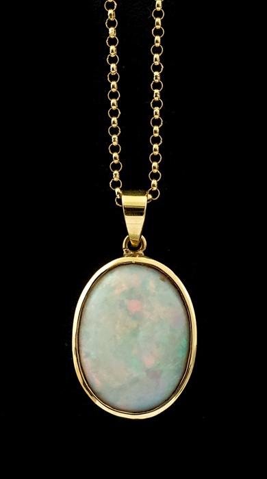 An 18K opal Pendant, the oval cabochon approx. 19m