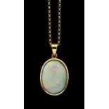 An 18K opal Pendant, the oval cabochon approx. 19m