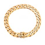 A 9ct heavy yellow gold flat curb link bracelet