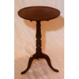 An early 19th Century oak wine table, circular mou