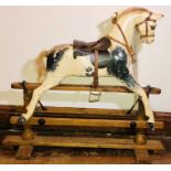 An early 20th century child's rocking horse with a