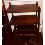 An Edwardian mahogany serving trolley, circa 1905, rectangular form mounted with turned globe