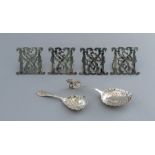 A set of four late 19th Century white metal place