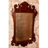 A George III mahogany wall looking glass of small