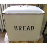 A vintage white enamel bread bin and cover. (1) Co