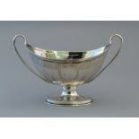 A George III silver boat shaped twin handled sucri