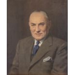 Frank S. Eastman (British, 1878-1964), portrait of a gentleman, half length in a grey suit, signed
