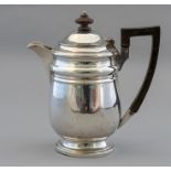 A George V silver coffee pot, hinged cover, maker