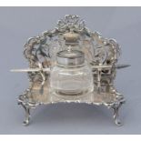 An Edwardian silver inkstandish, pierced back with