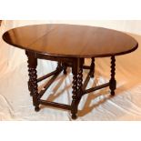 A George I revival oak gateleg table, oval droplea