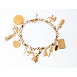 A 10ct yellow gold curb link charm bracelet collet