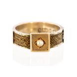 A late Victorian 9ct gold mourning ring, set with