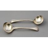 A pair of late Victorian silver sauce ladles, thre