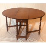 An early 18th Century George I oak gateleg table,