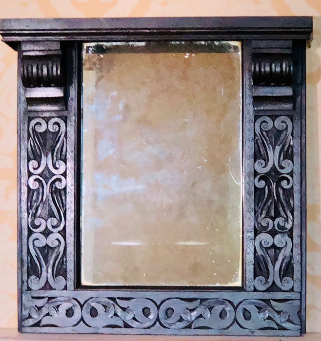 A 17th Century Revival oak mirror, in a carolean m