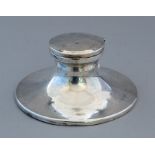 A George V circular weighted silver capstan ink, B