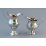 A George III silver baluster jug with pedestal bas