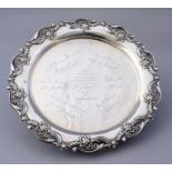 A George V silver salver, floral leafage cast rais