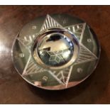 A silver star design trinket dish, ball feet, Shef