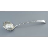 A silver soup ladle with scallop bowl, stamped Ste