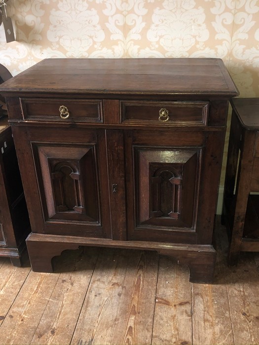 *** ITEM LOCATION BISHTON HALL*** An 18th Century style oak cabinet, rectangular top above a
