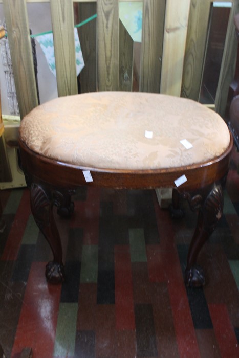 ***LOCATED AT GRESLEY****Two 1920's reproduction Regency oval stools with ball and claw feet