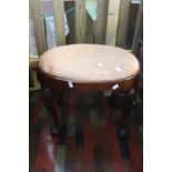 ***LOCATED AT GRESLEY****Two 1920's reproduction Regency oval stools with ball and claw feet