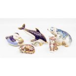 Five Royal Crown Derby gold stopper paperweights including dolphin, polar bear, duck and two cats
