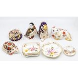 A collection of Royal Crown Derby paperweights, second quality, including a seal, puffin,