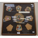 ***WITHDRAWN*** A framed montage of wooden love tokens, hand painted with floral scenes possibly