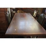 ***LOCATED AT GRESLEY**** Mid 20th Century oak refectory style table with two pullout leaves,